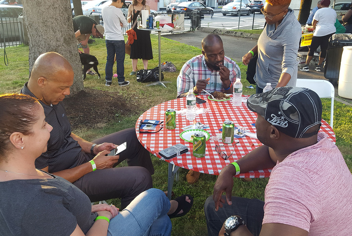 Table of People at Caribbean Jerk Festival